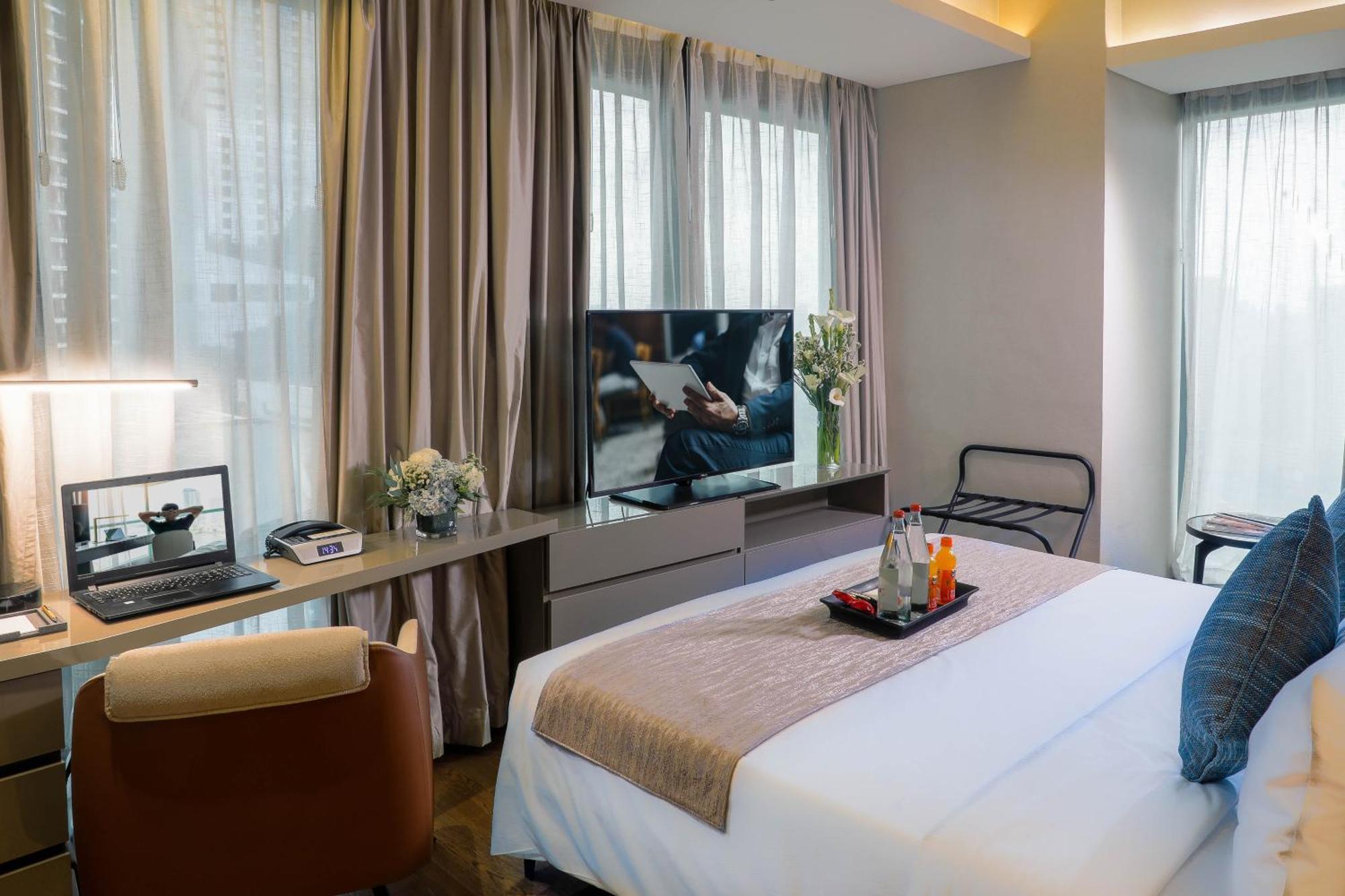 Отель Oakwood Makati Avenue Макати Экстерьер фото